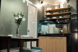 Fridge, microwave, stovetop - 2-Bedroom Elegant Condo with Sunrise & Mountain View (Butuan City)