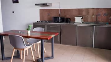 Apartment, 1 Bedroom, Balcony | Private kitchen | Fridge, microwave, stovetop, highchair