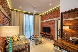 Suite – deluxe (King) | Oppholdsområde | TV