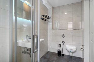 Hair dryer, towels, soap, shampoo