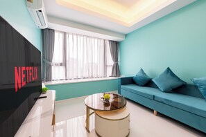 Comfort Apartment | Living area | 43-inch Smart TV with digital channels - The Pinnacle Residence Service by Soben (Phnom Penh)