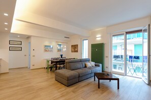 Apartment, 2 Bedrooms, Balcony, Partial Sea View | Living area