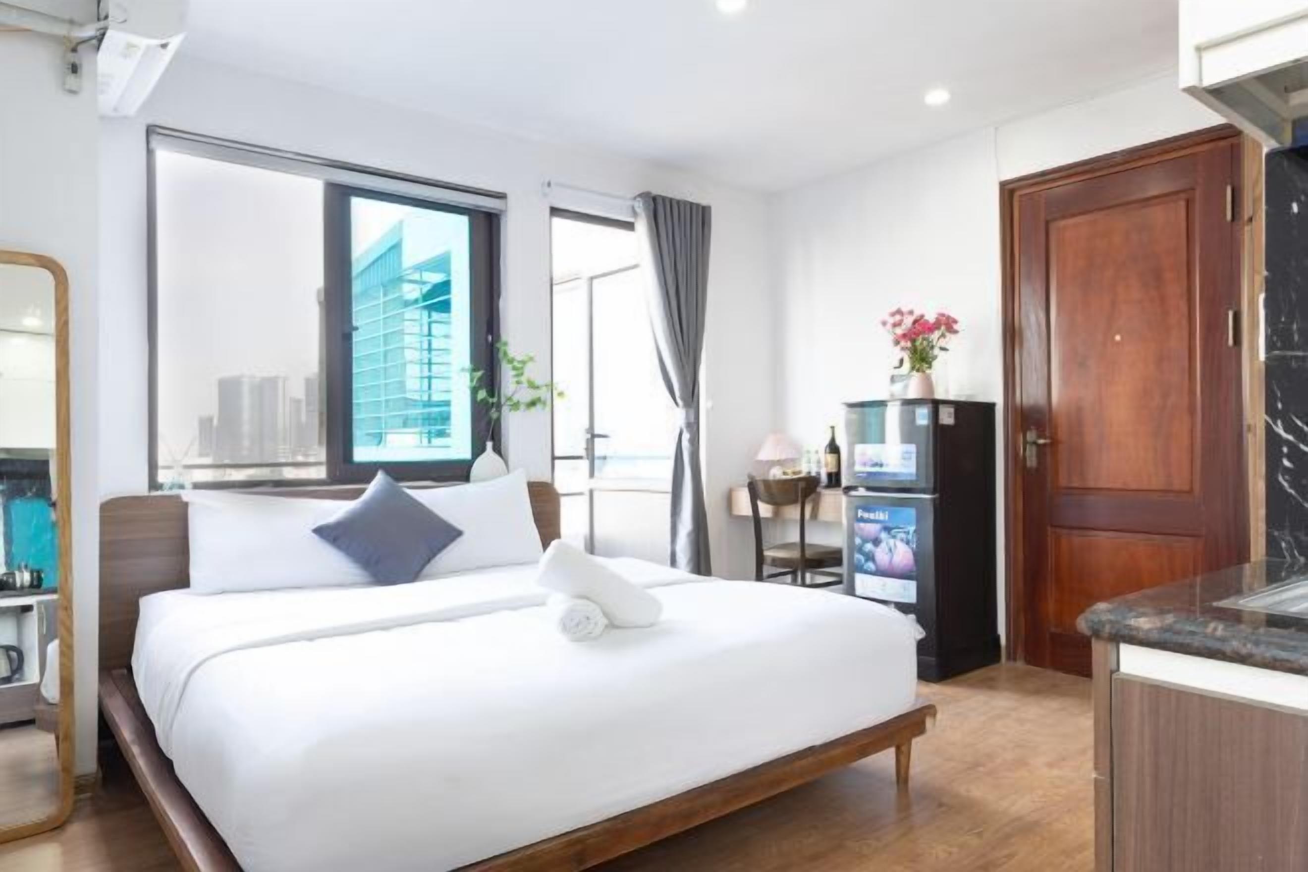 Pillow-top beds, desk, laptop workspace, blackout curtains