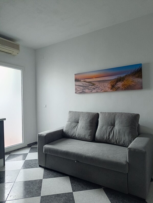 Living area - Apartment Palomino Baeza. The comfort of a downtown apartment. Ideal for families. (Unknown)