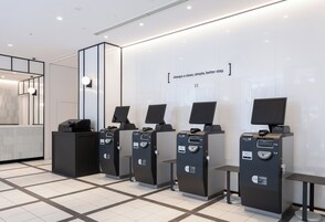 Check-in/check-out kiosk