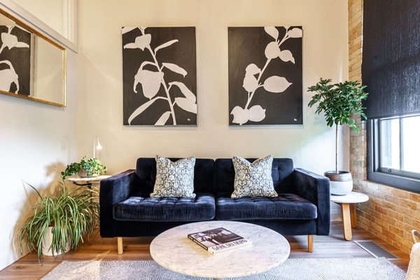 Modern décor meets historic charm in a Stratford Ontario heritage loft – part of Bradshaw’s award‑winning adaptive re‑use.