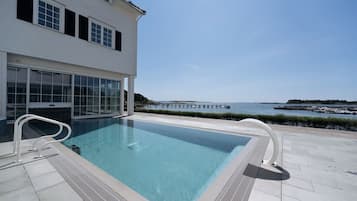Indoor pool, outdoor pool, open 7:00 AM to 9:00 PM, sun loungers