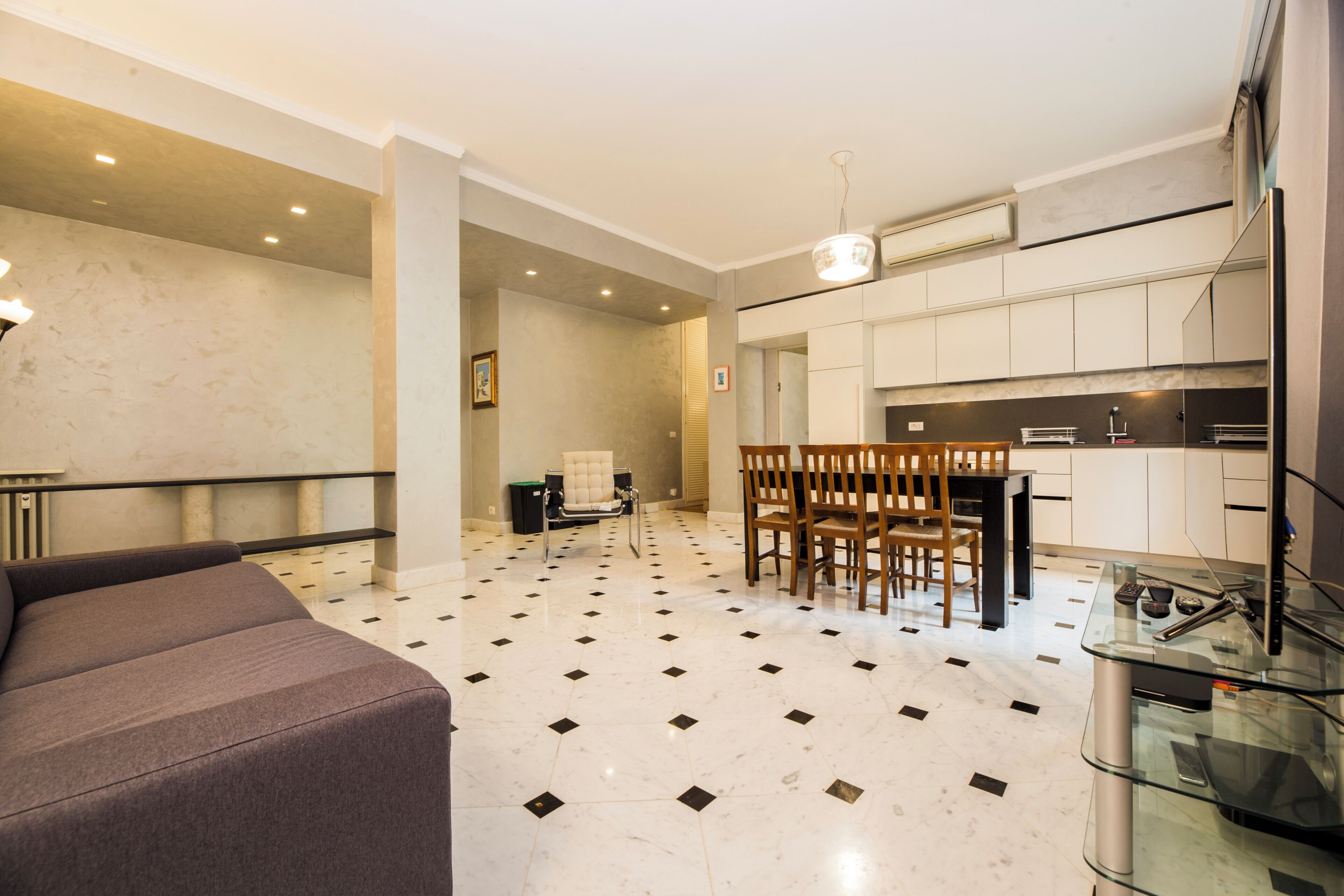 Apartment, 2 Bedrooms, Balcony, Courtyard View | Living area | 32-inch flat-screen TV with cable channels