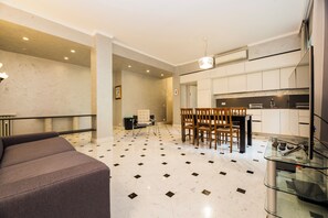 Apartment, 2 Bedrooms, Balcony, Courtyard View | Living area | 32-inch flat-screen TV with cable channels - Spacious flat with Balcony (Genoa)