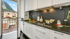 Standard Apartment, 1 Bedroom, Balcony (Casa Epofo - Riva del Garda Apartment) | Private kitchen - Casa Epofo - Riva del Garda Apartment With Balcony (Riva del Garda)