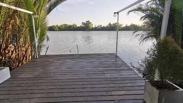 Deluxe Suite, River View | Terrace/patio