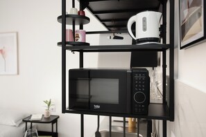 Apartment, 2 Bedrooms, 2 Bathrooms | Private kitchen | Fridge, microwave, stovetop, coffee/tea maker