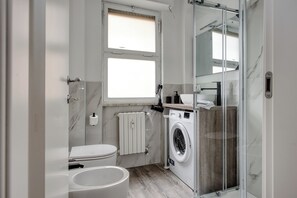 Apartment, 2 Bedrooms, 2 Bathrooms | Bathroom | Shower, free toiletries, hair dryer, bidet - JOIVY Elegant Double Studios near Subway Station (Milan)