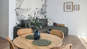 Superior Apartment | Living area | 50-inch Smart TV with cable channels