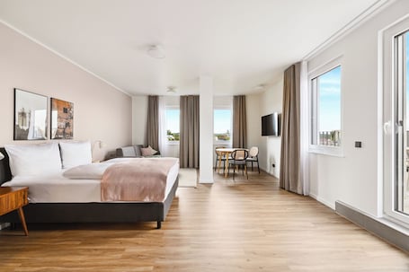 SuĆte conforto, 1 cama Queen e sofĆ”-cama, sacada | Individualmente decorados, individualmente mobiliados, escrivaninha