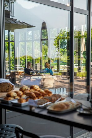 Daily buffet breakfast (EUR 21 per person)