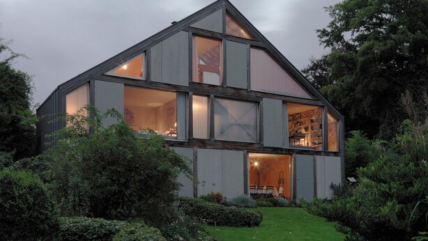 A modern two-story house with large windows and a well-maintained garden. - FOUR SEASONS HOUSE (Doudeville)