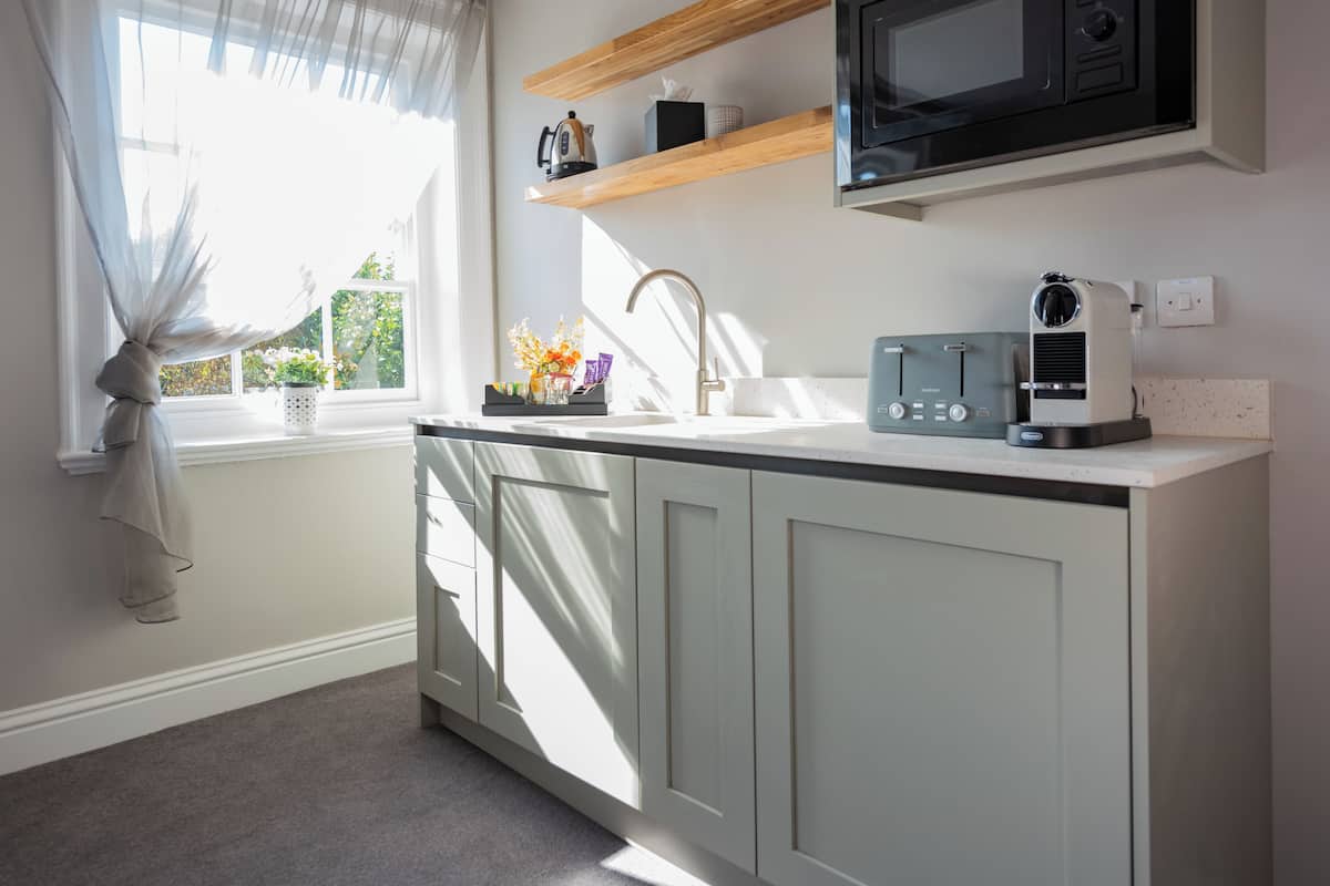 Fridge, microwave, cookware/dishes/utensils