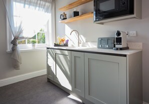 Fridge, microwave, cookware/dishes/utensils