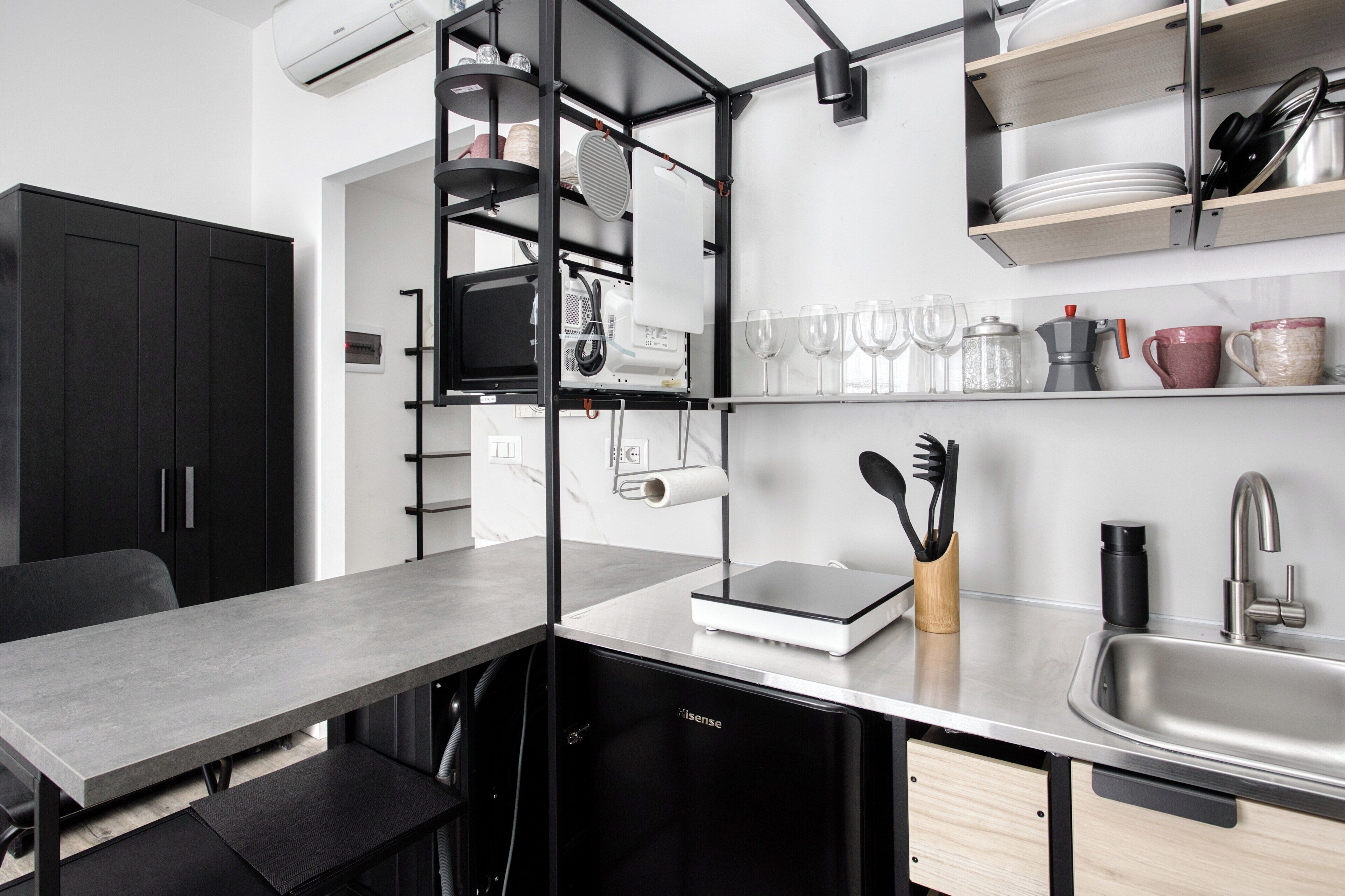 Studio, 1 tweepersoonsbed | Privékeuken | Een koelkast, een magnetron, een kookplaat, een waterkoker