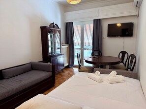 Apartment, Balcony | Living area | 30-inch flat-screen TV with digital channels - Neos Kosmos Family Apartment (Athens)