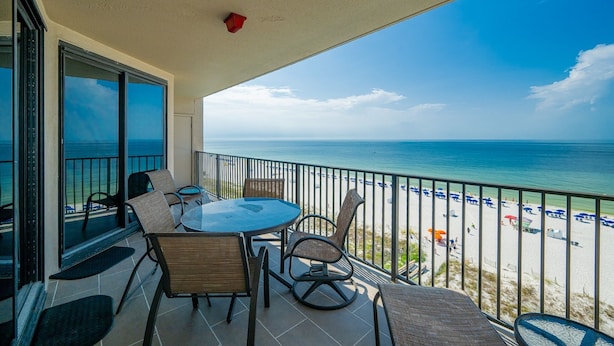 A balcony with a view of the beach and ocean. - Phoenix X 809 3 Bedroom Condo (Orange Beach)