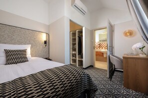 Habitación individual estándar | Caja de seguridad en la habitación y escritorio 