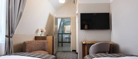 Standard Double or Twin Room | Minibar, in-room safe, desk, iron/ironing board