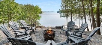 Private 235 ft waterfront retreat with over an acre on Lake Rosseau