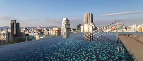 Outdoor pool, pool umbrellas, pool loungers