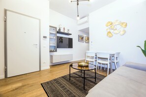 Apartment, 2 Bedrooms | Living area | 43-inch Smart TV with digital channels - Chic apartments in Piazza Dante (Genoa)