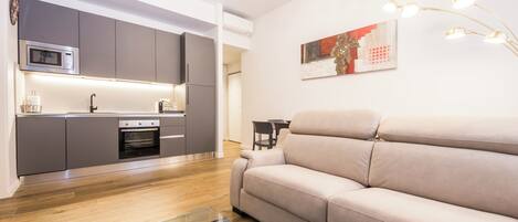 Apartment, 1 Bedroom | Living area | 43-inch Smart TV with digital channels