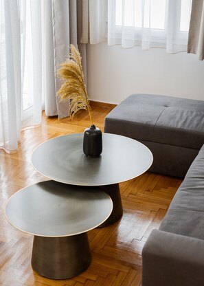 Deluxe Apartment, Balcony | Living area | 40-inch Smart TV with digital channels