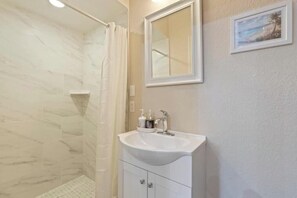 Hair dryer, towels, soap, shampoo