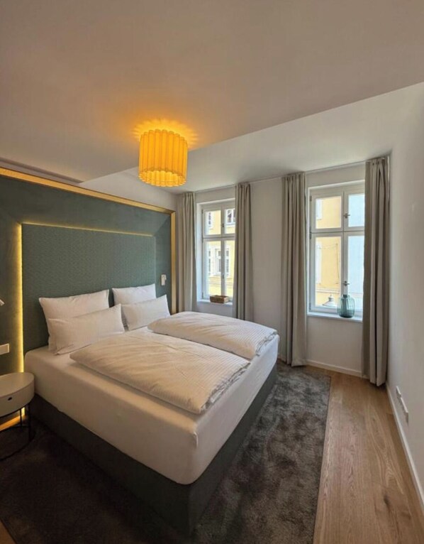 2 slaapkamers, een strijkplank/strijkijzer, reisbedje, gratis wifi