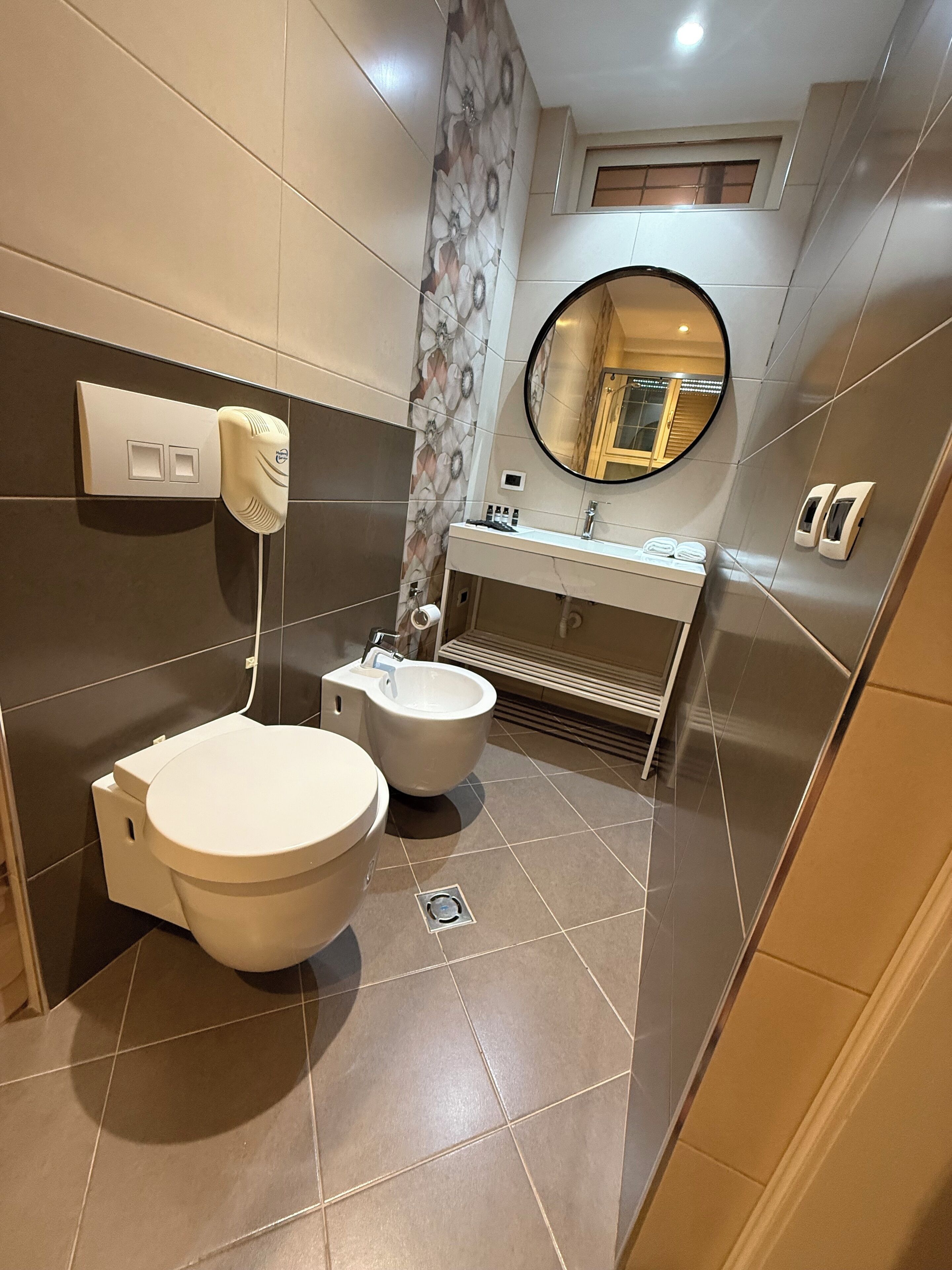 Hair dryer, towels, soap, toilet paper