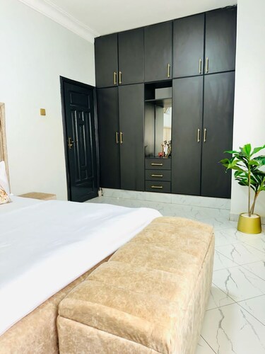 Cozy luxurious and spacious 1-bedroom apartment in beautiful Kampala with WiFi.