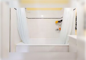 Hair dryer, towels, soap, toilet paper