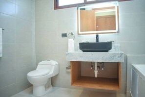 Shower, towels, soap, toilet paper