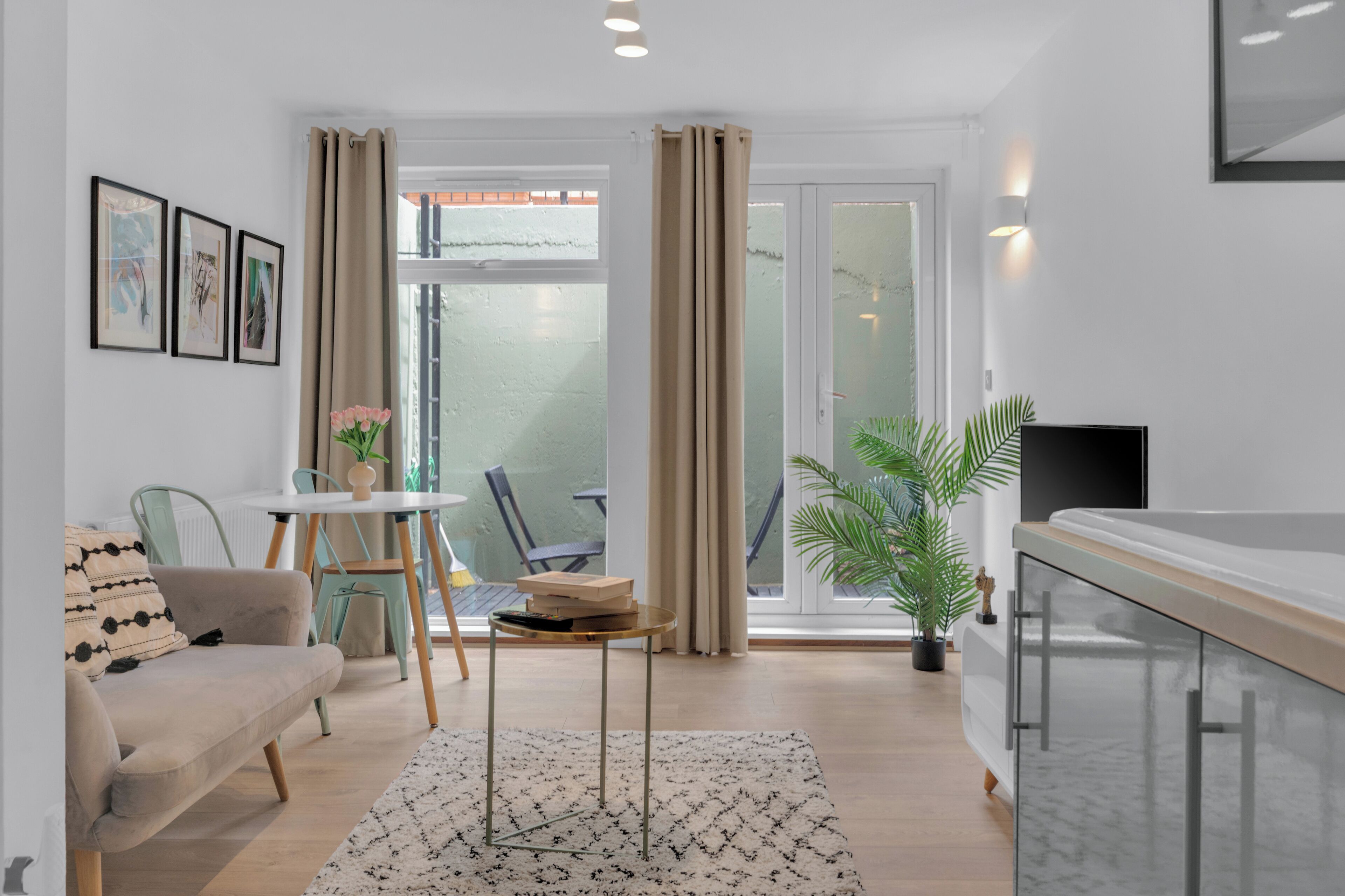 Standard Apartment | Living area | 26-inch TV with cable channels