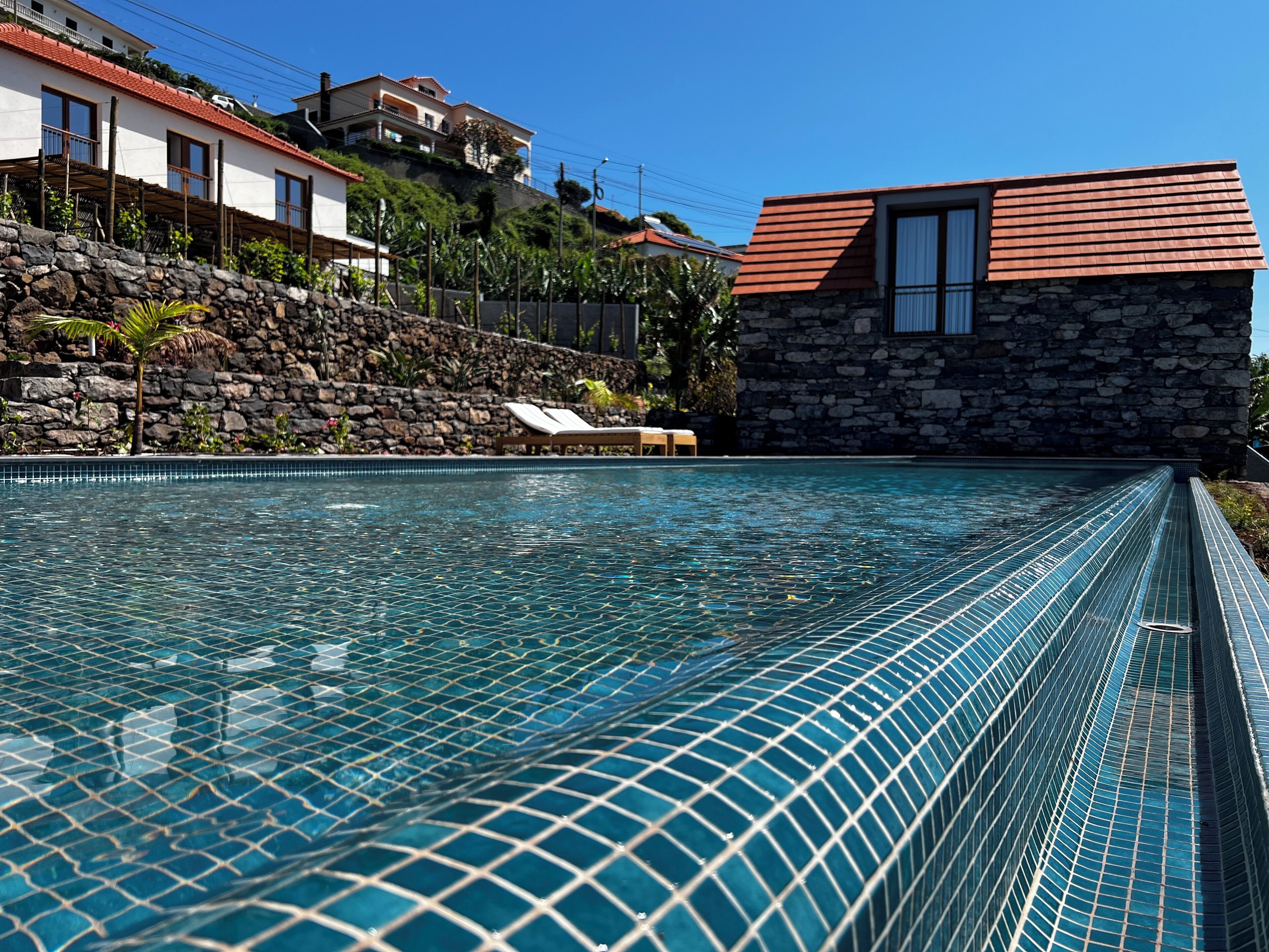 Outdoor pool, open 8:00 AM to 9:00 PM, pool loungers