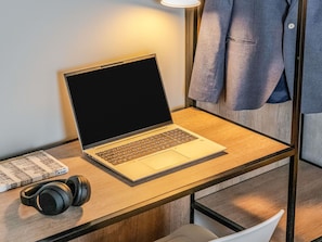 Laptop workspace, blackout drapes, soundproofing, free WiFi