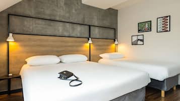 Blackout curtains, soundproofing, free WiFi, bed sheets