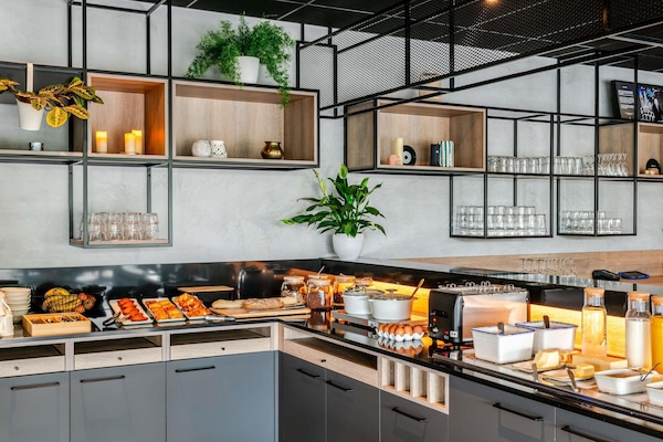 Daily buffet breakfast (EUR 12 per person)