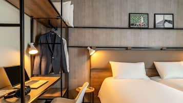 Habitación estándar, 2 camas individuales | Cortinas blackout, insonorización, wifi gratis y ropa de cama
