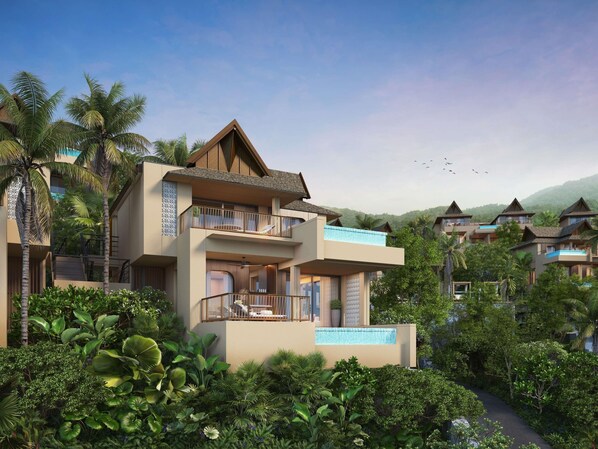 A modern resort building with multiple balconies, a swimming pool, and lush tropical vegetation. - Navera Phuket - Mgallery Collection (Choeng Thale)