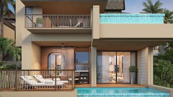 A two-story house with a swimming pool, outdoor seating, and a balcony.