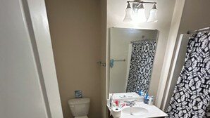 A bathroom with a toilet, sink, and shower. - This property is not available any longer sorry for inconvenience (Moncks Corner)