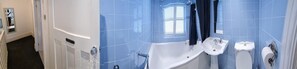 Separate bathtub and shower, deep-soaking bathtub, hair dryer, towels