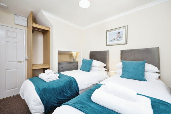 2 habitaciones y ropa de cama